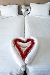 Sousse, Tunisia A hotel bed decorated with hearts.