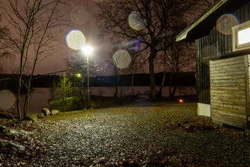 Stockholm, Sweden A night view of Källtorpssjön, a small lake in the Nacka Nature  Reserve.