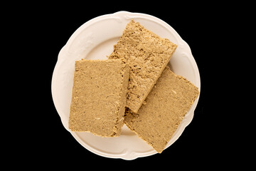 Fragrant sweet halva on the table, top view, macro.