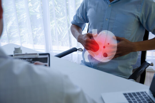 Gerd. young man patient suffering stomach ache meet doctor in hospital, gastroesophageal reflux disease, food poisoning, people painful stomachache, gynecology, medical and health care concept