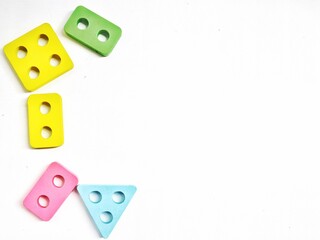 Naklejka premium Colorful Wooden Geometric Shape Sorting Toy for Early Learning, Preschool Education, Fine Motor Skills, Cognitive Development, and Kids Montessori Activity Isolated on White Background