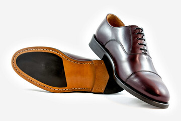 Classic leather shoes in a white background. 