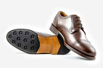 Classic leather shoes in a white background. 