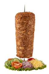 Rotating meat skewer with fresh vegetables isolated on a transparent background