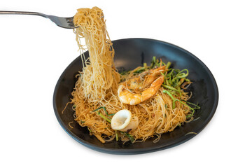 Top view of Stir Fried Rice Vermicelli with Water Mimosa and Shrimp, focus selective
