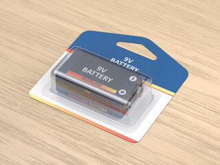 9V alkaline battery in blister pack on wooden desk