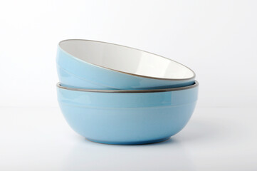 Two Blue bowls close up on white background