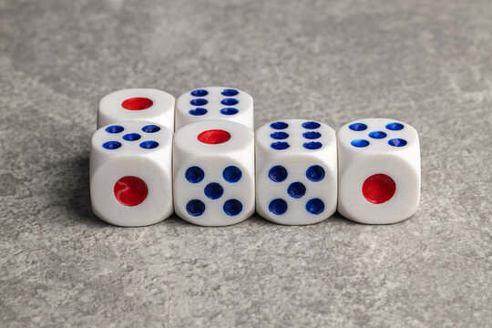 dice on a wooden table