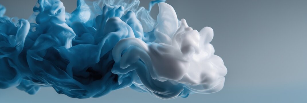 Abstract blue and white ink wisps on smooth grey background