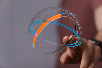 Conceptual image of a hand interacting with a holographic globe. Representing technology, digital world, and innovative concepts. Sui