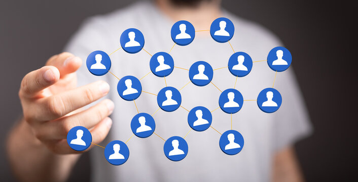 Hand reaching out to connected network of people icons. Depicting teamwork, connection and communication in bus