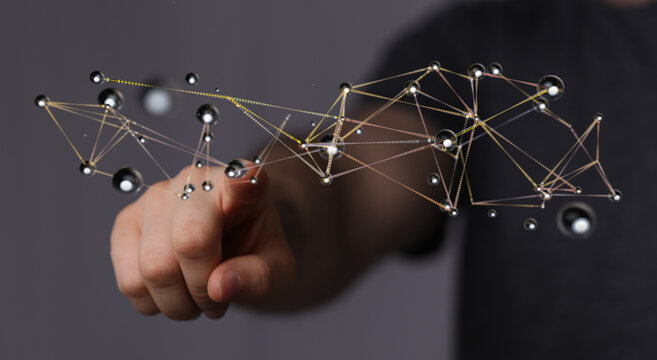 Person interacting with a digital network, representing technology, connection, and data flow. Futuristic visua