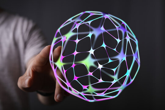 Abstract image of a hand holding a glowing digital sphere, symbolizing technology, networks, and global connections. Perfect for tech