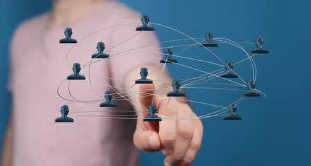 Digitally connected human figures and a hand touching network. Illustrating concept of connection, networking, global collaboration and communic