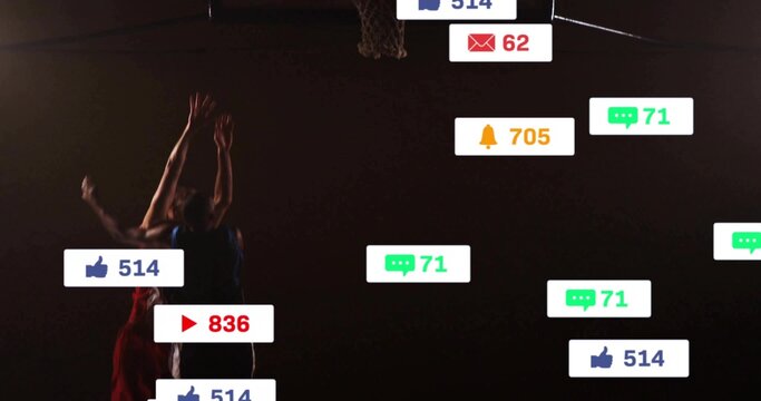 Contesting two basketball players jumping at gym hoop, wearing jerseys, social icons, copy space - Powered by Adobe