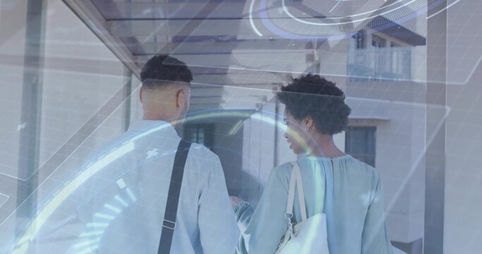 Walking couple wearing light tops and shoulder bags, moving through glass walkway with blue HUD