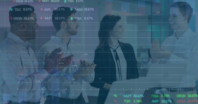 Clapping four colleagues gathering around laptop in office, in blazers, showing stock ticker charts