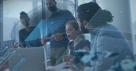 Meeting five colleagues in boardroom in business casual, viewing open laptop, papers, pen, AR clock