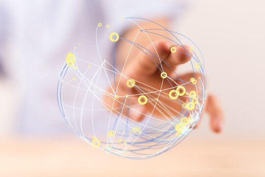 Abstract visualization of global network, hand touching a digital sphere with connected dots. Concepts like connectivity, communicati