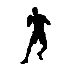 Silhouette of a male boxer in fighting stance with fists raised ready for combat