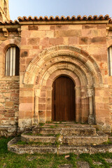 Fototapeta premium Romanesque Church of San Martin Obispo with River and Bridge in Salcedillo