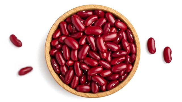 Red kidney beans in wooden bowl with overhead.