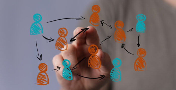 Hand interacts with digital network of people icons and arrows, symbolizing communication, social connections, teamwork, and data flow. Ideal fo