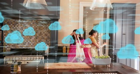 Two women entering doorway, causing tech overlay, woman in pink unpacking mesh bag for meal prep - Powered by Adobe