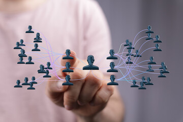 Concept of teamwork and interconnectedness illustrated with abstract people connecting. Shows community, collaboration and business strategies,