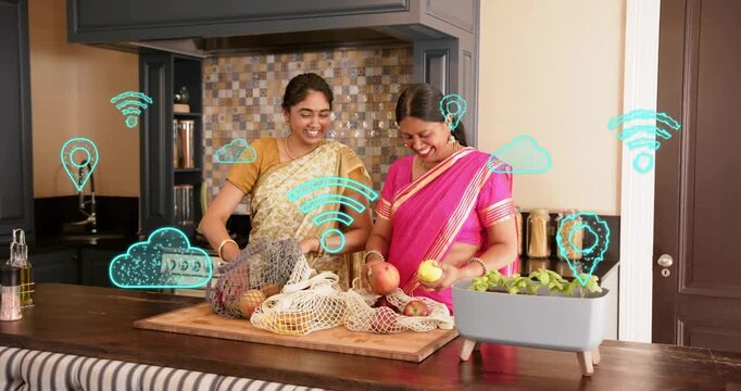 Mom-daughter unpacking mesh bags sorting fruits for cooking causing teal WiFi cloud icons circling