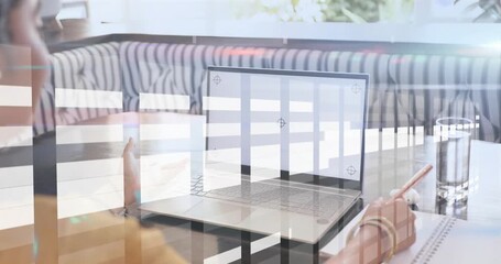 Woman reaching trackpad and pointing laptop while taking tech notes as grid passing over subject