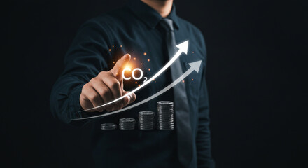 Businessman's finger touches rising CO2 graph with stacks of coins symbolizing economic impact and environmental cost