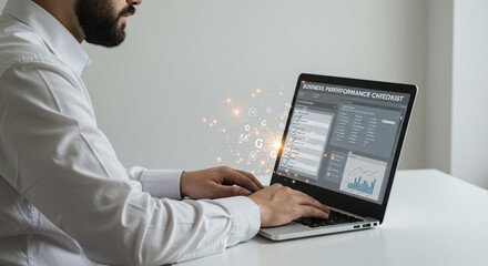 Professional businessman meticulously reviews business performance checklist on laptop, visualizing growth strategies and achieving success.