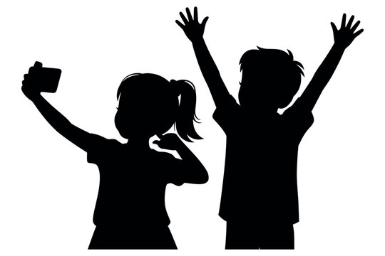 Two children joyfully pose for a selfie together with raised arms.