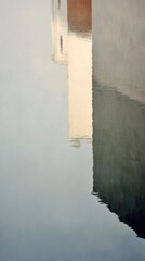 Abstract Reflection of a Building in Calm Water Surface