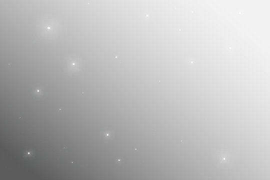 Glowing glitter dust and sparkling flare float in the air on a transparent background. Magical light and shimmering particles create a festive holiday design with elegant sparkle effects.