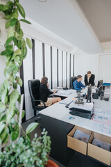 A business team working together in a contemporary office setting, discussing plans and examining documents. The room is adorned with indoor plants, creating a productive and eco-friendly atmosphere.