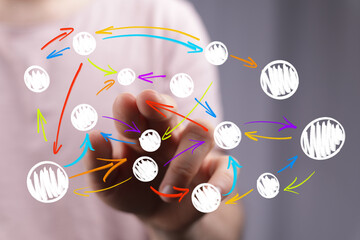 A hand interacts with a vibrant network diagram illustrating connections, communication, and information exchange in a modern digital environmen