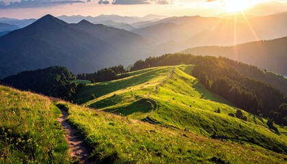 A scenic mountain landscape bathed in the warm glow of the setting sun, featuring lush green hills, a winding dirt path, and layers of distant peaks.