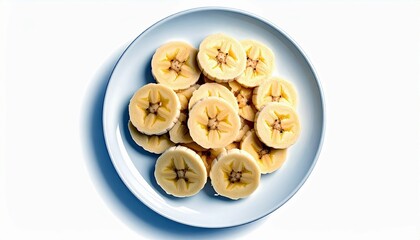 A light blue plate is filled with sliced bananas, presented from a top-down perspective against a clean white background.