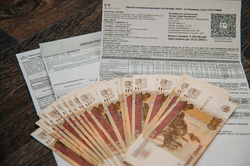 money is lying on utility bills
