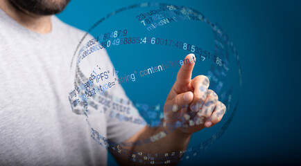 A man's hand interacting with a digital data sphere, symbolizing innovation, technology, and futuristic concepts. Perfect for illustr