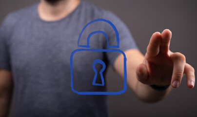 Person activating a virtual padlock icon, symbolizing advanced data protection, online privacy, and cybersecurity solutions in a connected world
