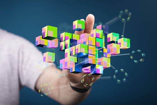 Digital concept of hand interacting with colorful geometric cubes. Technology and innovation in a creative visu