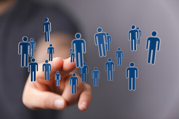 Human network, hand touching digital people icons. Represents community, connection, teamwork, social media, HR