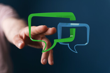 Hand reaching towards conceptual chat bubbles, representing digital communication and interaction, ideal for so