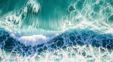 Vibrant turquoise ocean waves crashing creating foamy patterns
