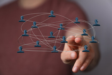 Concept of global network or social connection with digital interface. Hand touching connection and digital network.