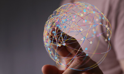 Abstract image depicting global network of connections in human hand, representing global communication, teamwork and futuristic concepts, a wor