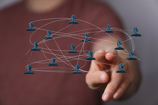 Concept of global network or social connection with digital interface. Hand touching connection and digital network.